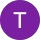 Purple circle with a white letter T.